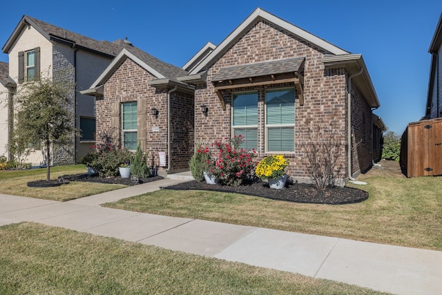 view of front of house with a front lawn