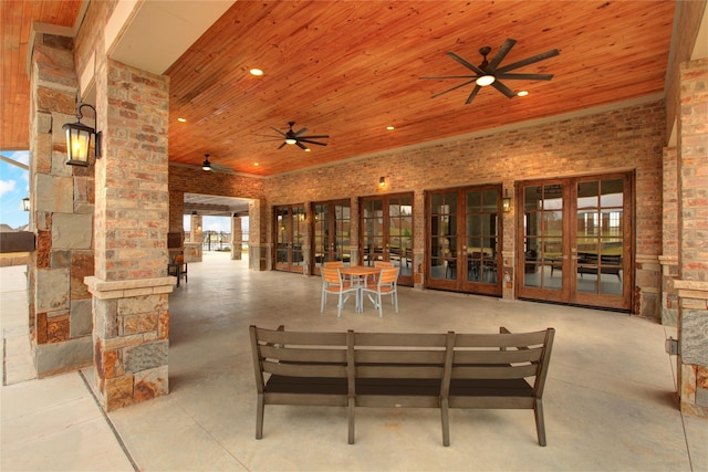 view of patio / terrace featuring ceiling fan, french doors, and an outdoor hangout area