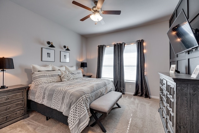 bedroom featuring ceiling fan and light colored carpet