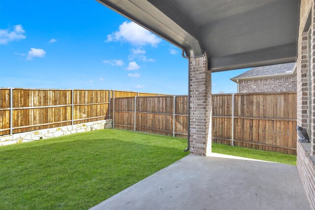 view of yard with a patio area