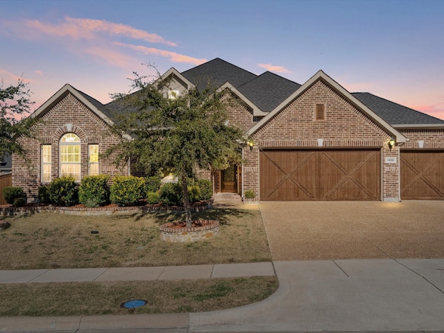 view of front of property with a garage