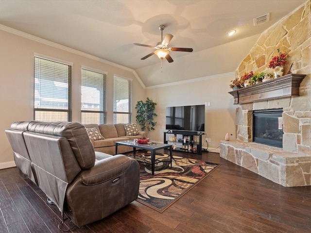 living room featuring ceiling fan, crown molding, dark hardwood / wood-style floors, and vaulted ceiling