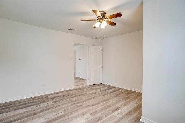 unfurnished room featuring ceiling fan and light wood-type flooring