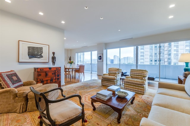 living room with light hardwood / wood-style flooring