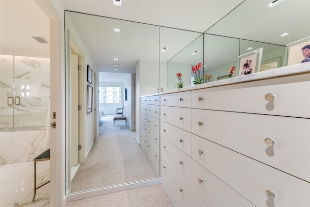 bathroom with vanity and walk in shower