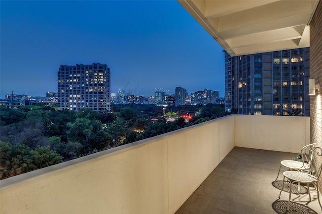 view of balcony at dusk