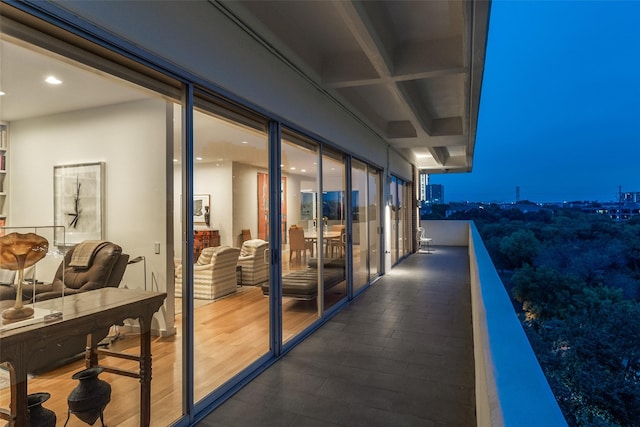 view of balcony at twilight