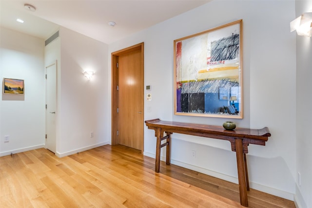 hall featuring light hardwood / wood-style flooring