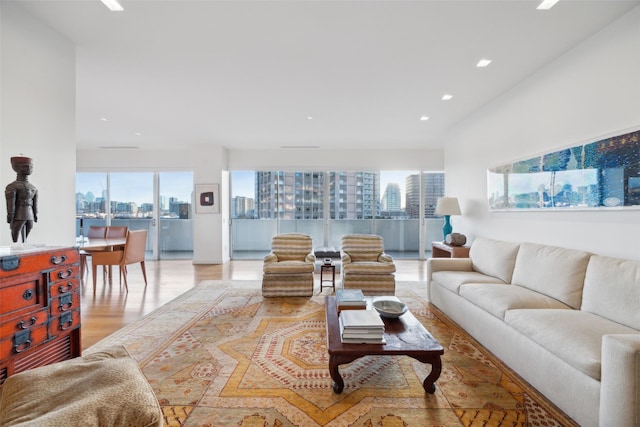 living room with light hardwood / wood-style flooring