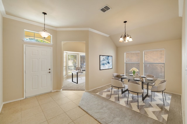 tiled entryway with vaulted ceiling, crown molding, a wealth of natural light, and a notable chandelier