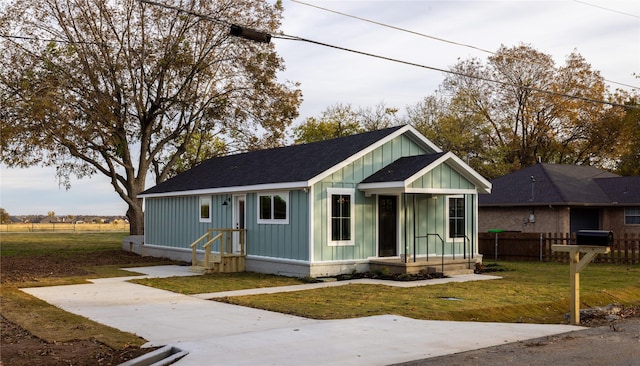 view of front of home with a front yard