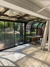 view of unfurnished sunroom