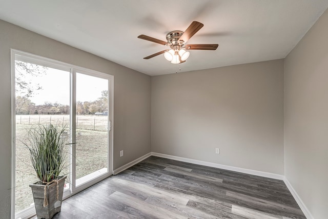 unfurnished room with wood-type flooring and ceiling fan