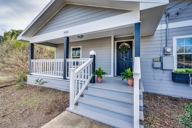 doorway to property featuring a porch