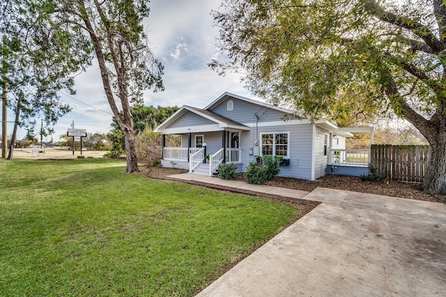 bungalow-style house with a porch and a front yard