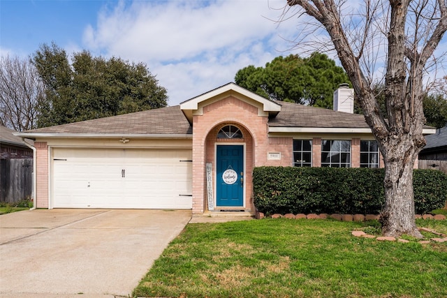 ranch-style home with a garage and a front lawn