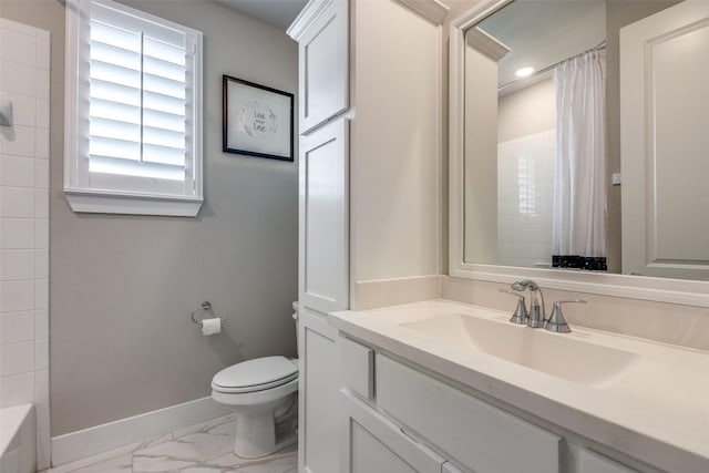 full bathroom featuring shower / tub combo, vanity, and toilet