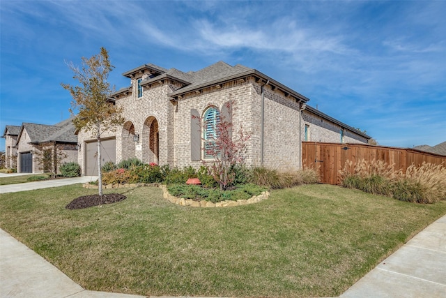 view of front of home with a front yard