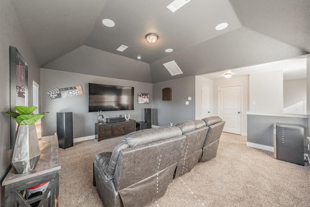 cinema featuring lofted ceiling and light colored carpet