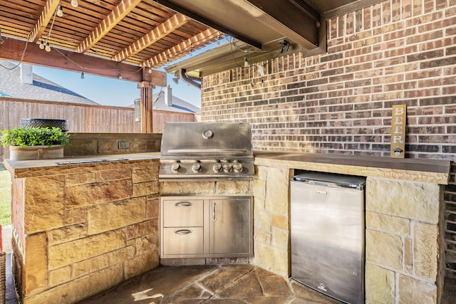 view of patio featuring area for grilling and grilling area