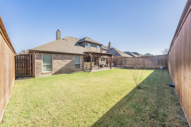 view of yard featuring a pergola and a patio area