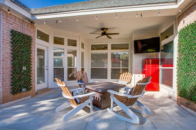 view of patio with ceiling fan