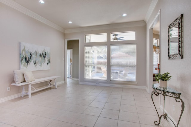 doorway to outside with light tile patterned floors and crown molding