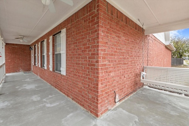 view of home's exterior featuring ceiling fan