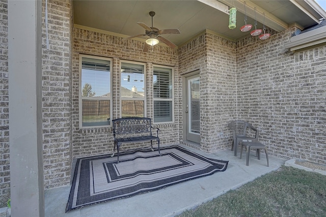 view of patio with ceiling fan