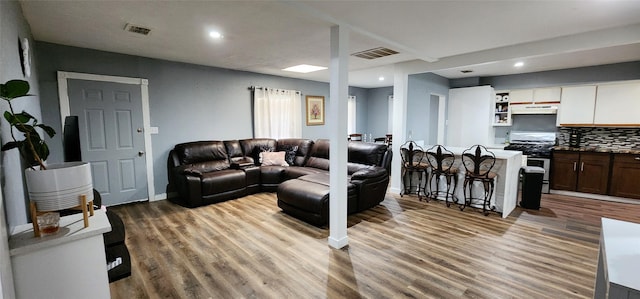 living room with hardwood / wood-style flooring