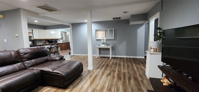 living room with hardwood / wood-style floors