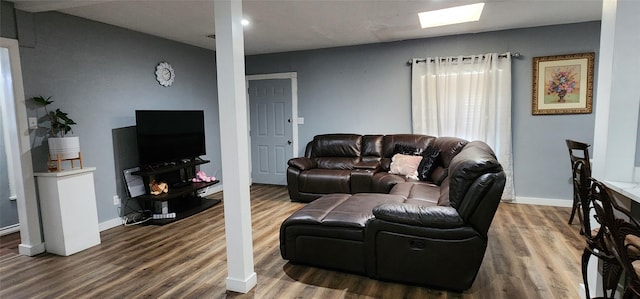 living room featuring dark hardwood / wood-style flooring