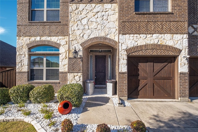 property entrance with a garage