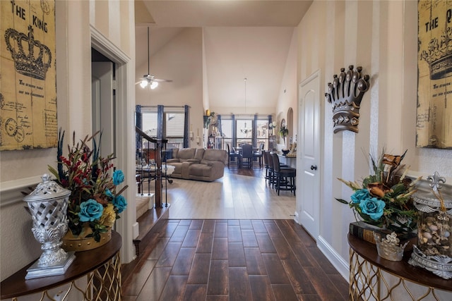 hallway with high vaulted ceiling