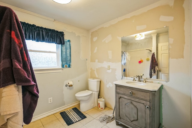 bathroom with vanity, curtained shower, tile patterned floors, and toilet