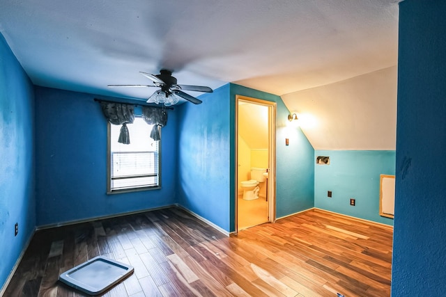 bonus room featuring ceiling fan, wood-type flooring, and vaulted ceiling