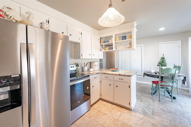 kitchen with light stone countertops, appliances with stainless steel finishes, kitchen peninsula, decorative light fixtures, and white cabinetry