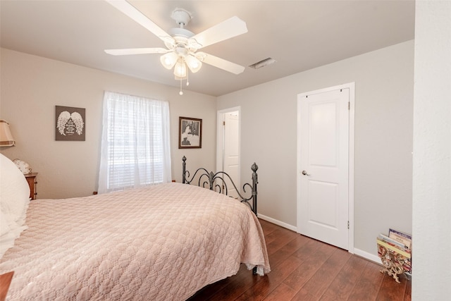 bedroom featuring ceiling fan and dark hardwood / wood-style flooring