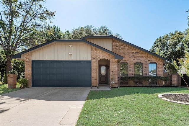 view of front of home featuring a garage and a front lawn