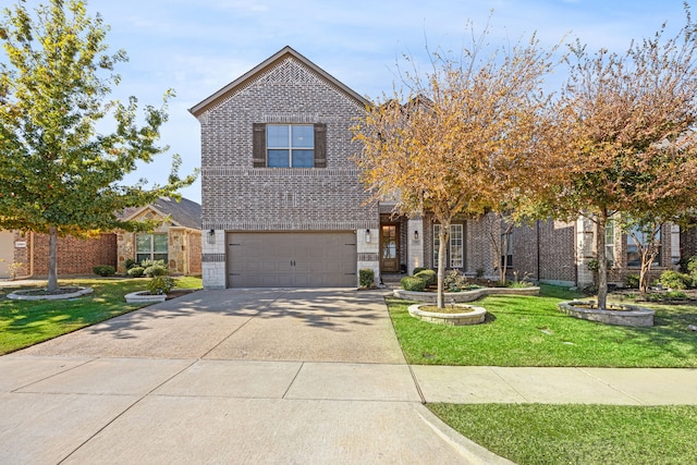 traditional-style home with a garage, driveway, brick siding, and a front yard