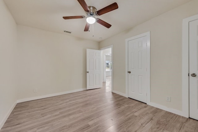 unfurnished bedroom featuring ceiling fan and light hardwood / wood-style flooring