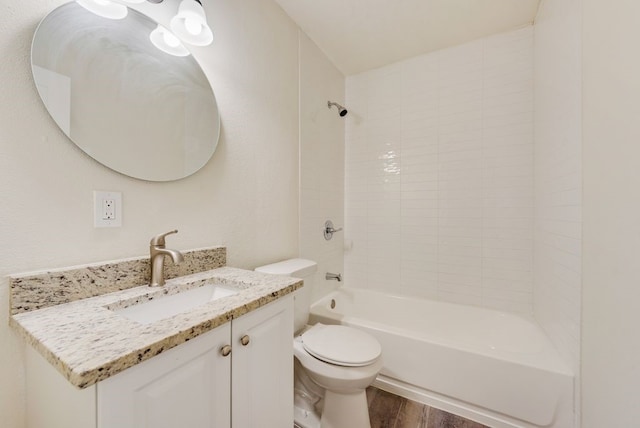 2233 Eastover Ave, Fort Worth, TX 76105 - bathroom featuring vanity, washtub / shower combination, and wood finished floors
