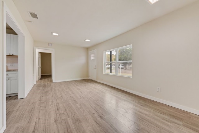 2233 Eastover Ave, Fort Worth, TX 76105 - unfurnished living room featuring light wood-style floors