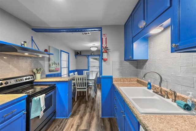 kitchen featuring blue cabinetry, stainless steel electric stove, and sink