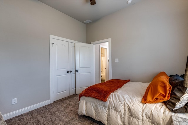 carpeted bedroom featuring a closet