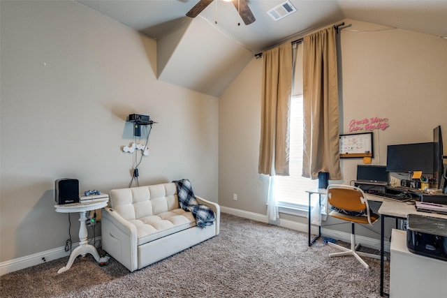 carpeted office featuring vaulted ceiling and ceiling fan