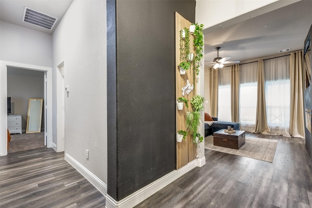 corridor with dark hardwood / wood-style floors