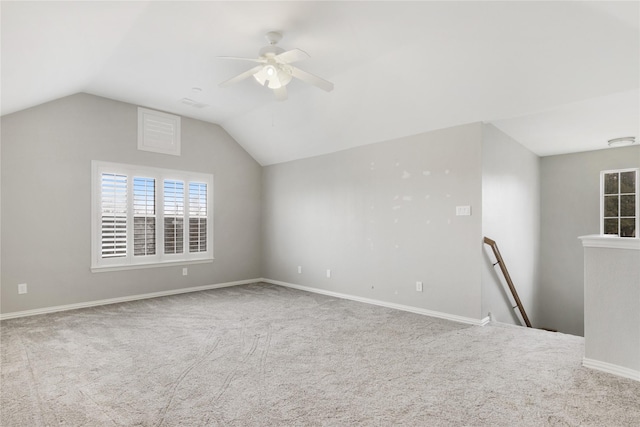 bonus room featuring vaulted ceiling, carpet floors, and ceiling fan