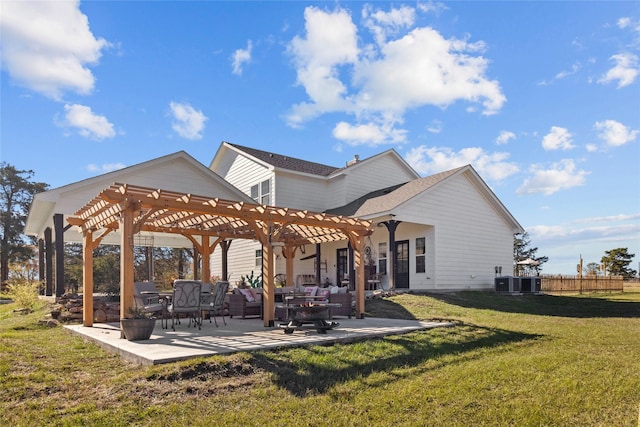 rear view of property featuring a patio, a lawn, and a pergola