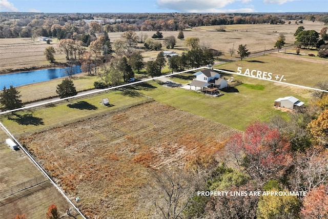 drone / aerial view featuring a water view and a rural view